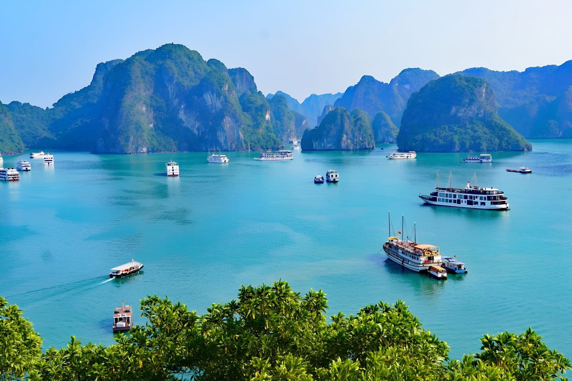 Ha Long Bay limestone karsts and turquoise waters, Pai Dai DMC Vietnam